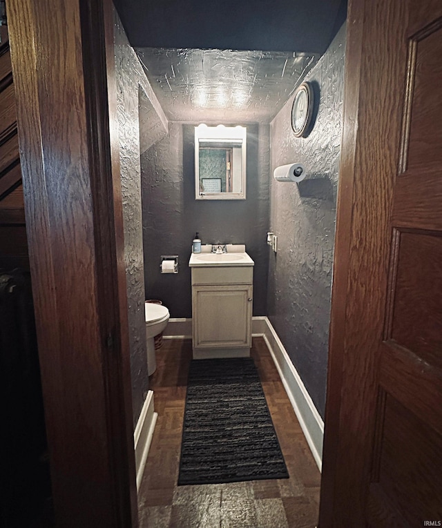 715 SE 2nd St, Washington, IN 47501 - bathroom featuring a textured wall and vanity