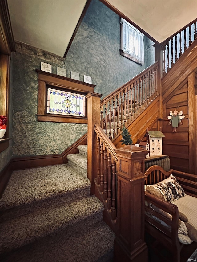 715 SE 2nd St, Washington, IN 47501 - stairway featuring carpet floors