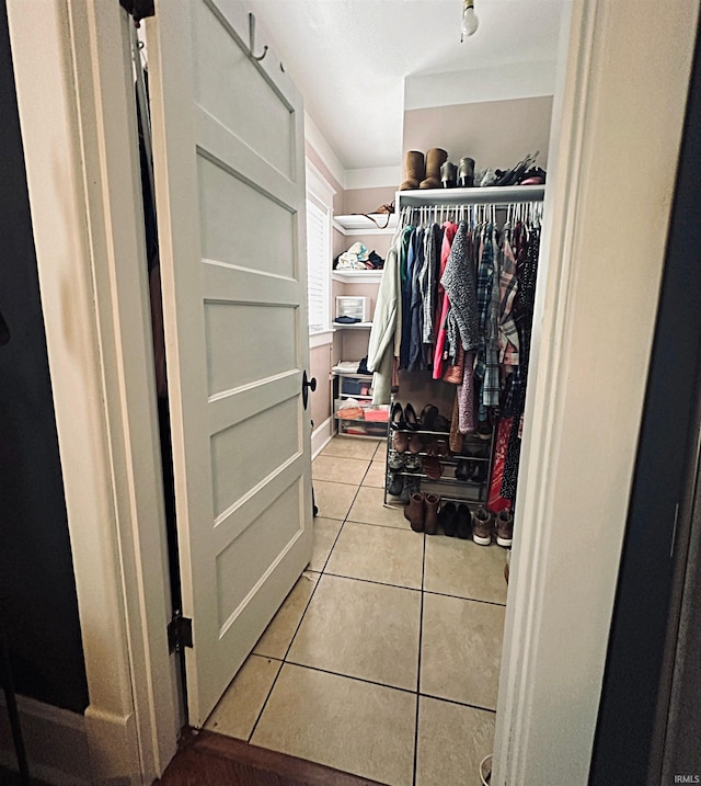 715 SE 2nd St, Washington, IN 47501 - walk in closet featuring light tile patterned floors