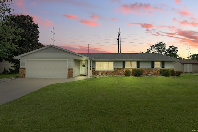 1209 Highland Dr, Auburn, IN 46706 - ranch-style house featuring an attached garage, concrete driveway, a front lawn, and brick siding
