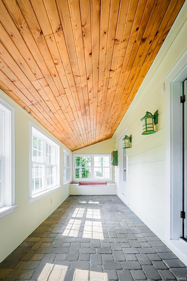 2801 W University Ave, Muncie, IN 47304 - unfurnished sunroom featuring vaulted ceiling and healthy amount of natural light