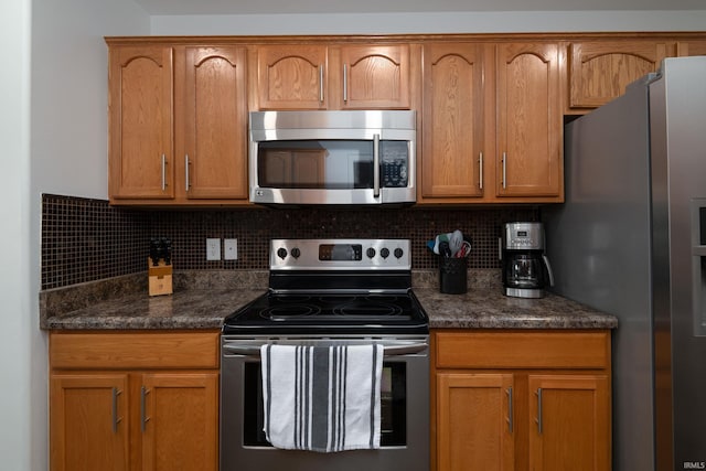 1811 Apopka Way, Fort Wayne, IN 46814 - kitchen featuring stainless steel appliances, backsplash, and brown cabinets