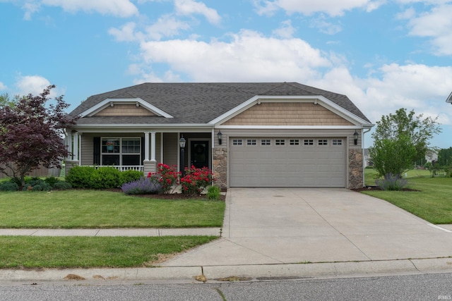 1811 Apopka Way, Fort Wayne, IN 46814 - craftsman house with an attached garage, a front lawn, concrete driveway, and stone siding