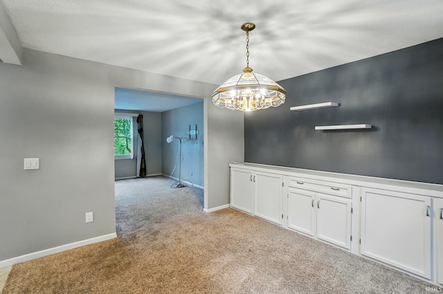 5820 Rosedale Dr, Fort Wayne, IN 46804 - unfurnished room with light carpet and a chandelier