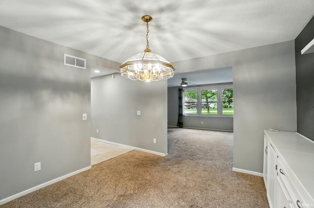 5820 Rosedale Dr, Fort Wayne, IN 46804 - empty room with light colored carpet, a chandelier, and ceiling fan
