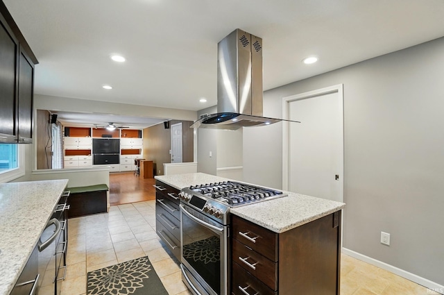 5820 Rosedale Dr, Fort Wayne, IN 46804 - kitchen featuring island range hood, stainless steel gas stove, ceiling fan, recessed lighting, and light tile patterned floors