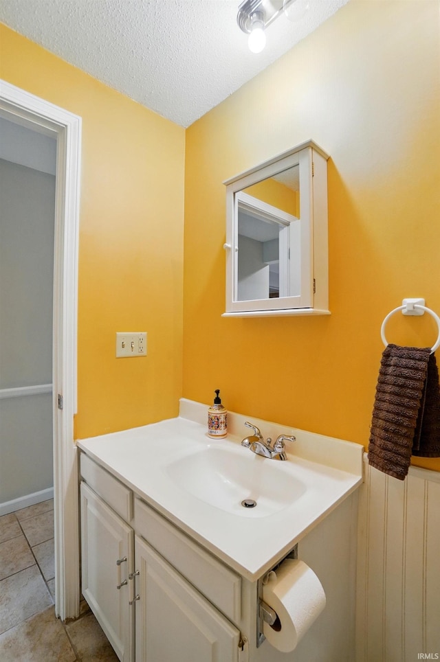 5820 Rosedale Dr, Fort Wayne, IN 46804 - bathroom featuring a textured ceiling, vanity, and tile patterned floors