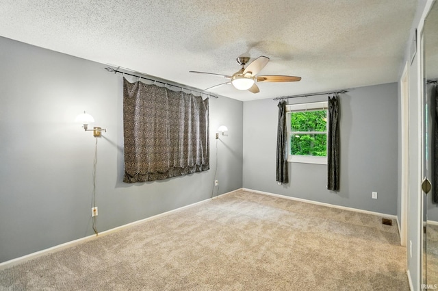 5820 Rosedale Dr, Fort Wayne, IN 46804 - carpeted spare room with ceiling fan and a textured ceiling