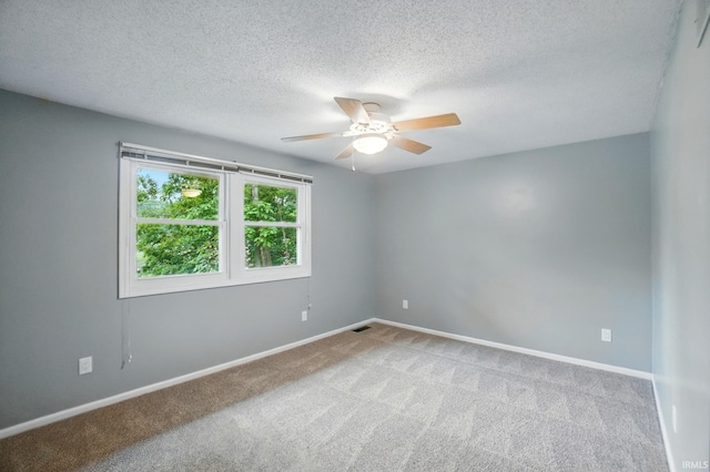 5820 Rosedale Dr, Fort Wayne, IN 46804 - carpeted spare room featuring a ceiling fan and a textured ceiling