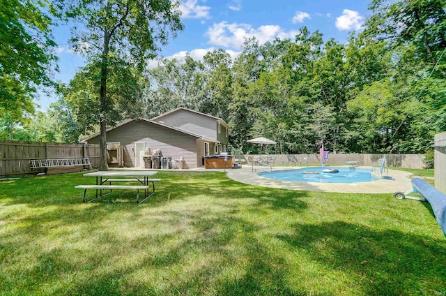 5820 Rosedale Dr, Fort Wayne, IN 46804 - fenced backyard featuring a hot tub and a patio area