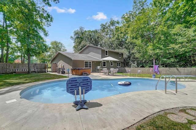 5820 Rosedale Dr, Fort Wayne, IN 46804 - view of swimming pool with a hot tub, a patio area, and a fenced backyard