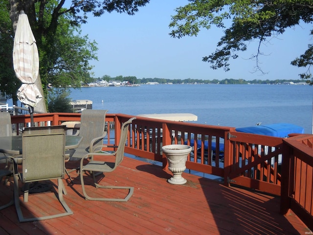 2910 Country Club Dr, Rochester, IN 46975 - wooden terrace featuring a water view and outdoor dining space