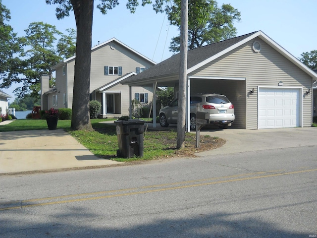2910 Country Club Dr, Rochester, IN 46975 - view of front of house with a garage and driveway