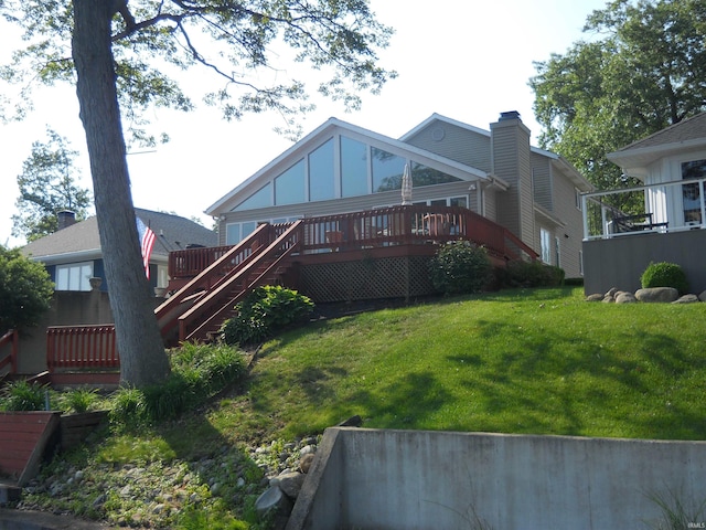2910 Country Club Dr, Rochester, IN 46975 - rear view of house with stairway, a deck, board and batten siding, and a yard
