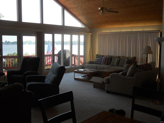 2910 Country Club Dr, Rochester, IN 46975 - carpeted living area featuring a water view, healthy amount of natural light, high vaulted ceiling, and wood ceiling