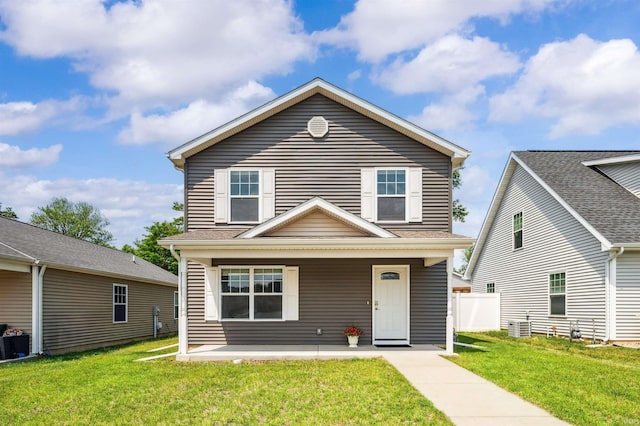 1729 Carter Ct, Mishawaka, IN 46545 - traditional-style house with a front lawn