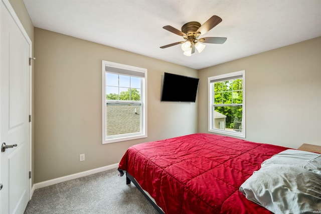1729 Carter Ct, Mishawaka, IN 46545 - carpeted bedroom with baseboards and a ceiling fan