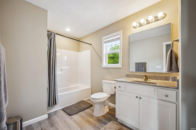1729 Carter Ct, Mishawaka, IN 46545 - bathroom with wood finished floors, vanity, and shower / bath combo