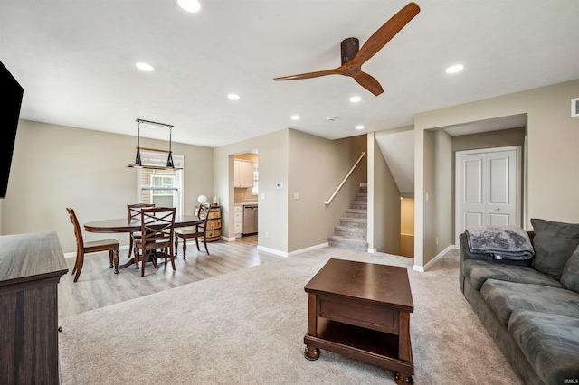 1729 Carter Ct, Mishawaka, IN 46545 - living area featuring recessed lighting, stairs, ceiling fan, and light colored carpet