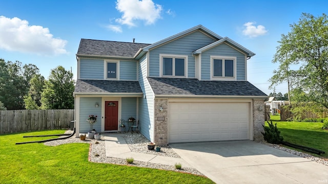 10412 Kentfield Pl, Fort Wayne, IN 46818 - traditional-style home featuring roof with shingles, a garage, and driveway