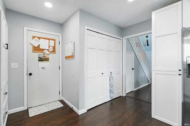 10412 Kentfield Pl, Fort Wayne, IN 46818 - entryway featuring dark wood-type flooring, recessed lighting, and stairs
