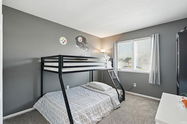 10412 Kentfield Pl, Fort Wayne, IN 46818 - carpeted bedroom with a textured ceiling and freestanding refrigerator