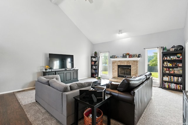 10412 Kentfield Pl, Fort Wayne, IN 46818 - living area featuring high vaulted ceiling, a glass covered fireplace, and light wood-style flooring