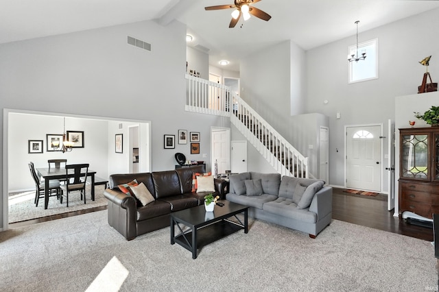 10412 Kentfield Pl, Fort Wayne, IN 46818 - living room with high vaulted ceiling, stairway, a chandelier, ceiling fan, and carpet