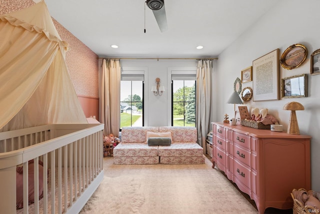11306 Fishers Pond, Middlebury, IN 46540 - bedroom with light colored carpet, recessed lighting, a nursery area, and ceiling fan