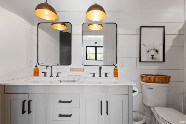 11306 Fishers Pond, Middlebury, IN 46540 - bathroom with double vanity and toilet