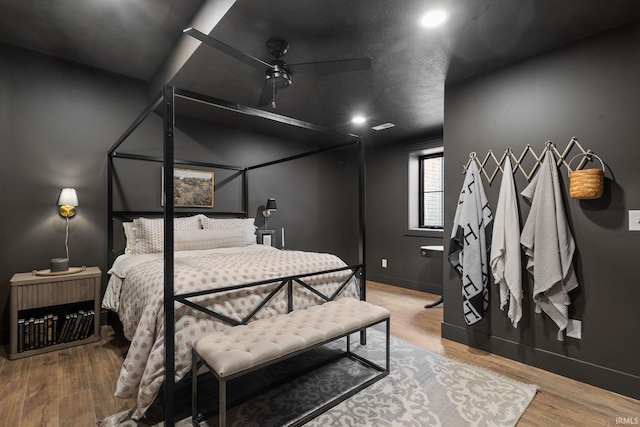 11306 Fishers Pond, Middlebury, IN 46540 - bedroom featuring wood finished floors, recessed lighting, and ceiling fan