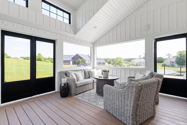 11306 Fishers Pond, Middlebury, IN 46540 - sunroom with lofted ceiling and outdoor lounge area