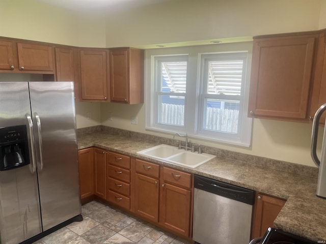 1715 Everett St, Lafayette, IN 47905 - kitchen featuring appliances with stainless steel finishes, brown cabinetry, and dark countertops