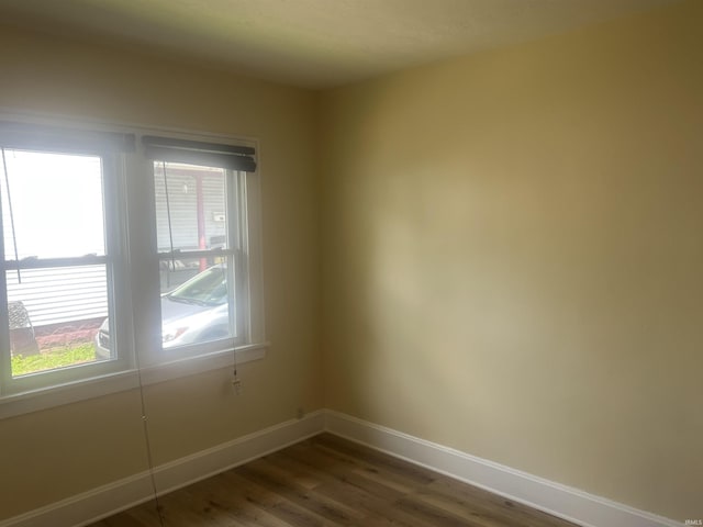 1715 Everett St, Lafayette, IN 47905 - spare room with dark wood-style flooring and baseboards