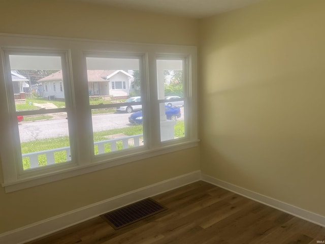 1715 Everett St, Lafayette, IN 47905 - spare room featuring healthy amount of natural light and dark wood-style flooring