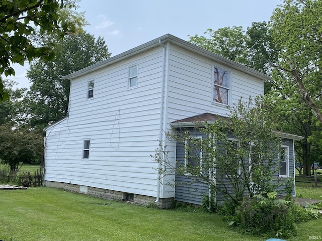 1409 W King St, Garrett, IN 46738 - view of property exterior featuring a yard