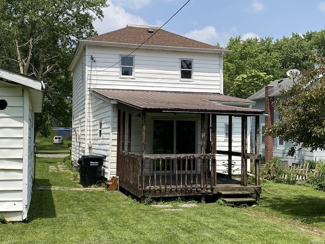 1409 W King St, Garrett, IN 46738 - back of house with a deck and a yard
