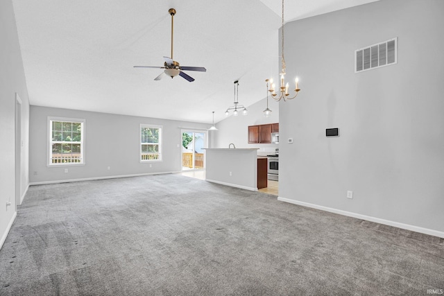 3549 S Wickens St, Bloomington, IN 47403 - unfurnished living room with a chandelier, ceiling fan, light carpet, and high vaulted ceiling