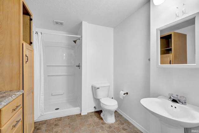 3549 S Wickens St, Bloomington, IN 47403 - full bathroom with a shower stall and a textured ceiling
