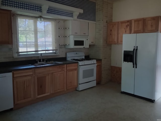 1340 Broadway St, Vincennes, IN 47591 - kitchen with white appliances and dark countertops