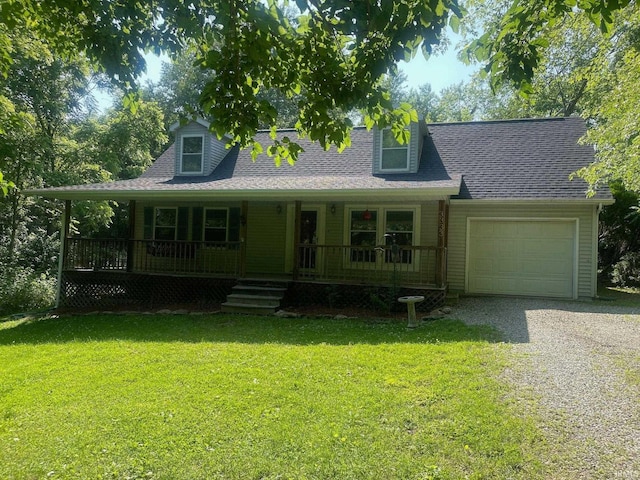 3333 W Cockrell Rd, Bloomington, IN 47403 - view of front of house with a garage, driveway, a porch, a front yard, and a shingled roof
