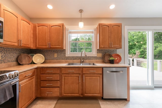 7486 S Ketcham Rd, Bloomington, IN 47403 - kitchen featuring appliances with stainless steel finishes, healthy amount of natural light, light countertops, and recessed lighting
