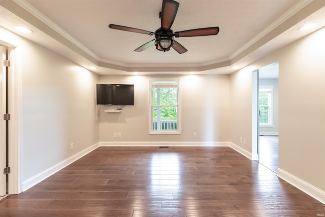 7486 S Ketcham Rd, Bloomington, IN 47403 - spare room with healthy amount of natural light, dark wood-type flooring, a ceiling fan, crown molding, and recessed lighting