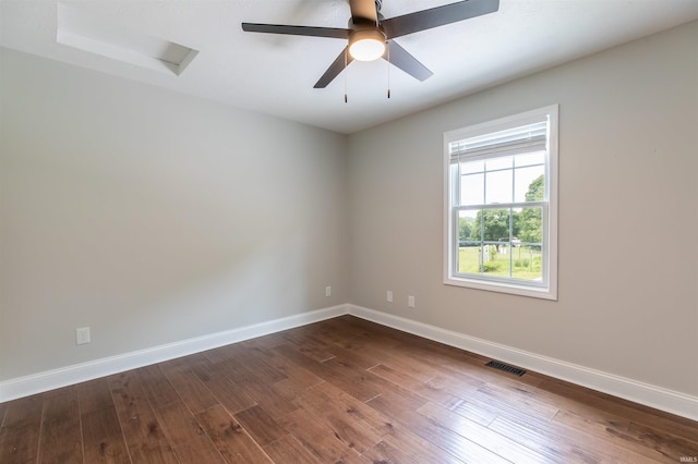 7486 S Ketcham Rd, Bloomington, IN 47403 - unfurnished room featuring dark wood-style floors and attic access