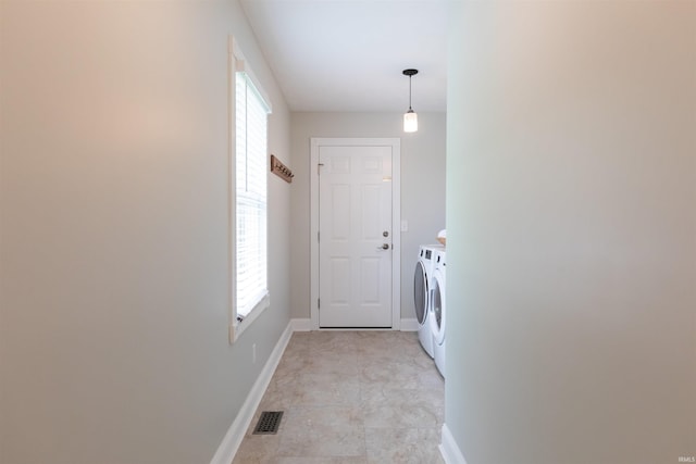 7486 S Ketcham Rd, Bloomington, IN 47403 - washroom featuring washing machine and clothes dryer and healthy amount of natural light