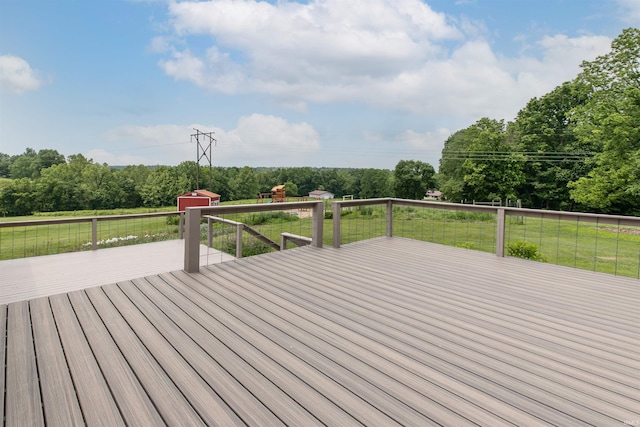 7486 S Ketcham Rd, Bloomington, IN 47403 - wooden terrace with a yard, an outdoor structure, and view of wooded area