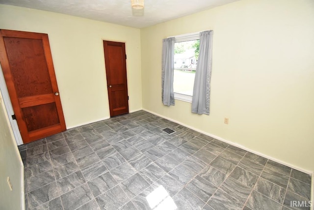 209 E Plum St, Linden, IN 47955 - empty room with baseboards