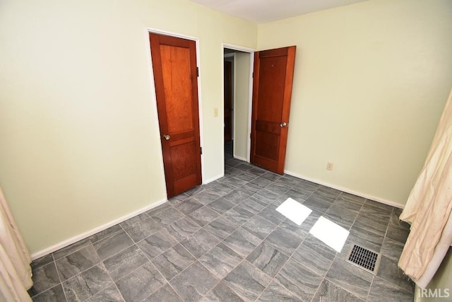 209 E Plum St, Linden, IN 47955 - spare room featuring baseboards