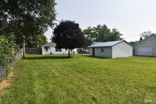 209 E Plum St, Linden, IN 47955 - view of yard with a garage and an outdoor structure
