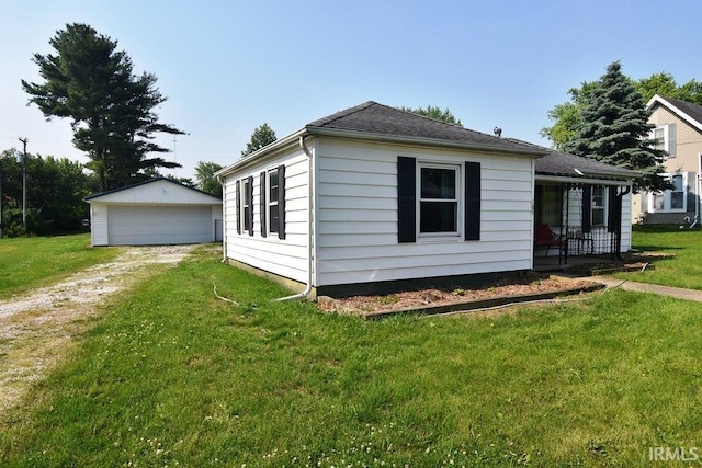 209 E Plum St, Linden, IN 47955 - ranch-style home featuring a front yard, an outbuilding, and a garage